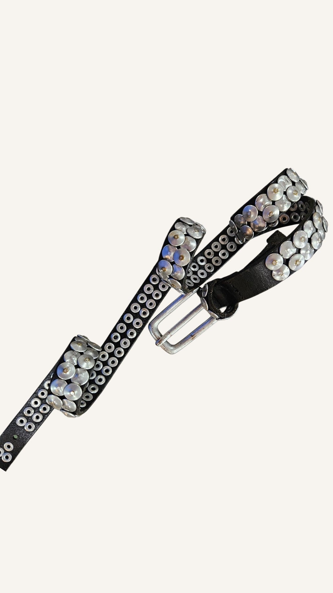 Narrow studded belt made from cowhide leather